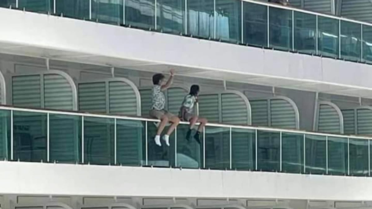 Cruise Ship Passengers on Balcony Railings